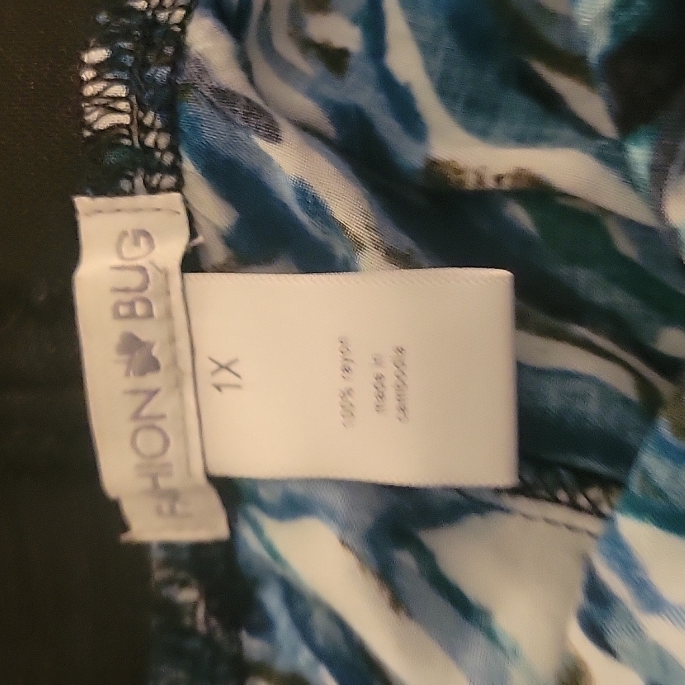 Fashion Bug Wide Elastic Waist Skirt in white, black, blue, and green. Size 1X. - Picture 4 of 5
